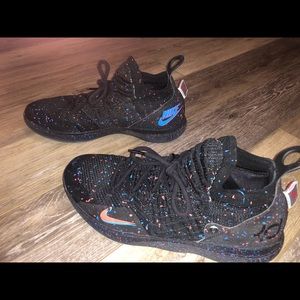 KD 11 Confetti “Just Do It” shoes